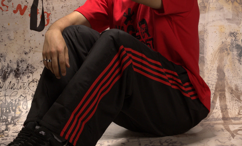 llllSTRIPS TRACK PANTS (bloody wave01)